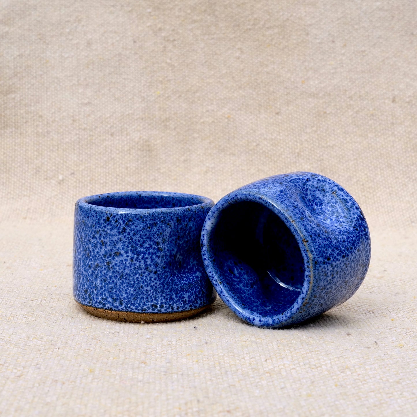 handmade ceramic espresso cup, blue speckled glaze, pinch cup, thumb cup, pottery