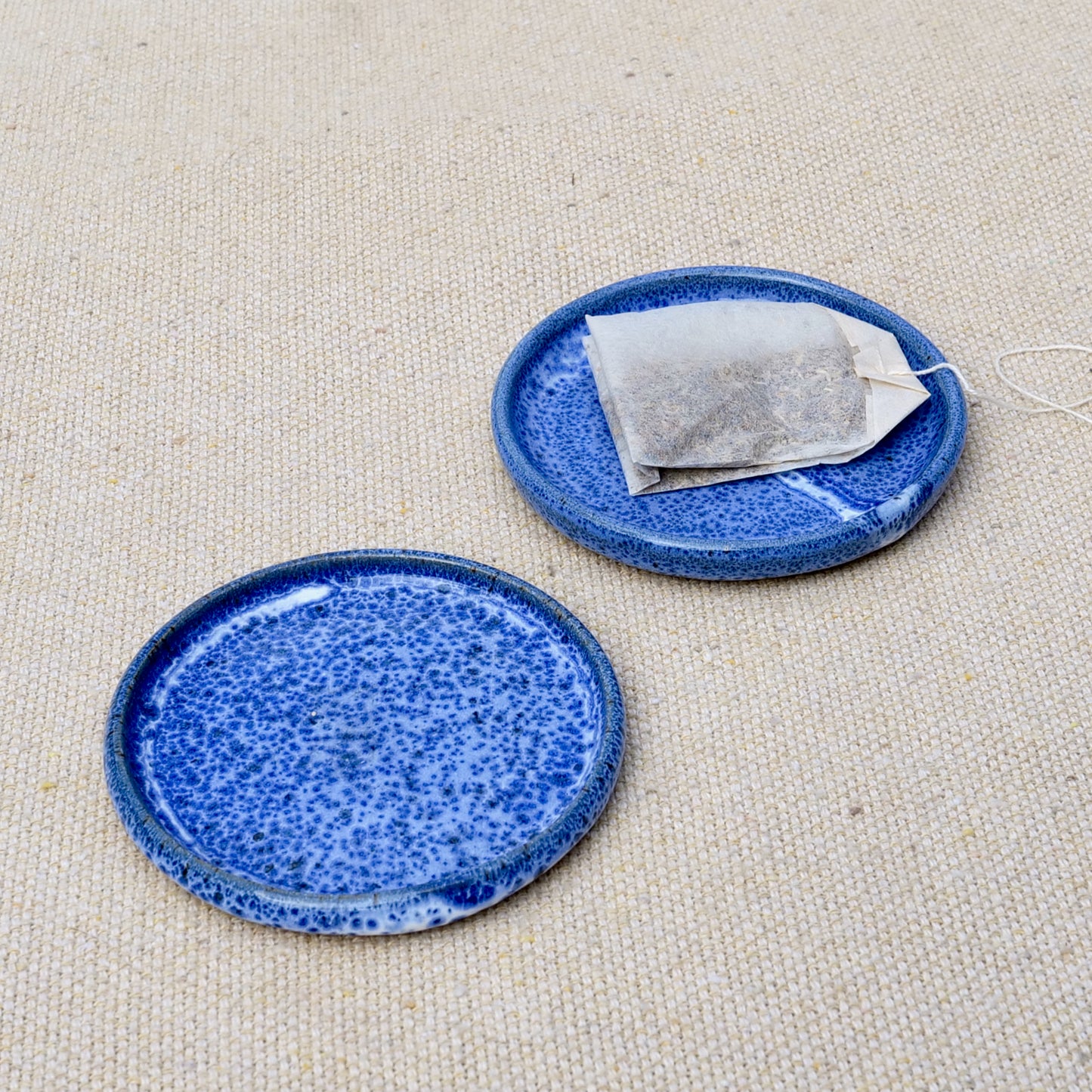 tiny handmade ceramic plate, teabag holder, trinket dish, blue speckled glaze, enamel, wheel thrown