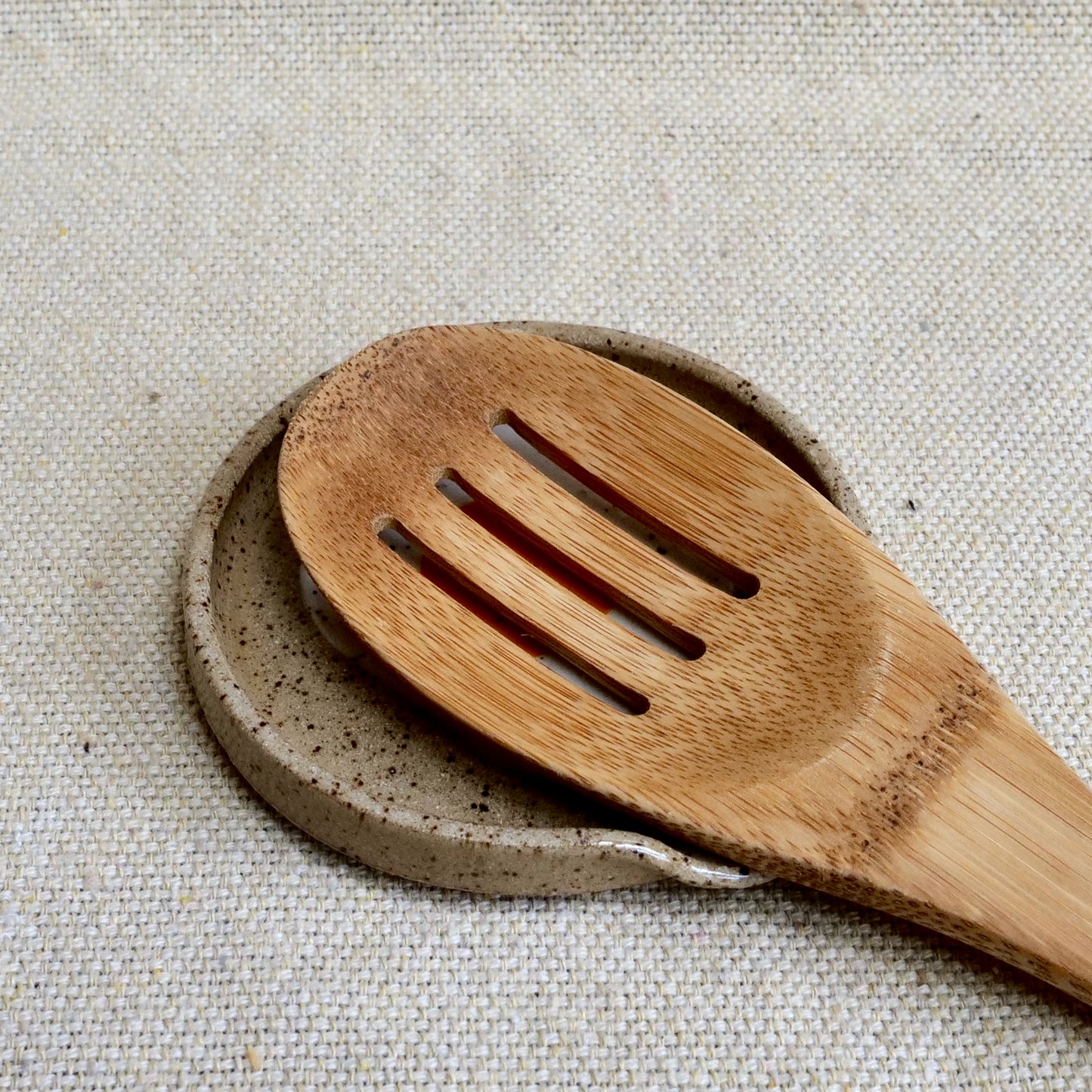handmade ceramic spoon rest with painted egg