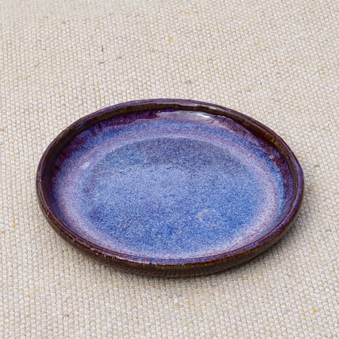 tiny handmade ceramic plate, teabag holder, trinket dish, purple and pink glaze, wheel thrown