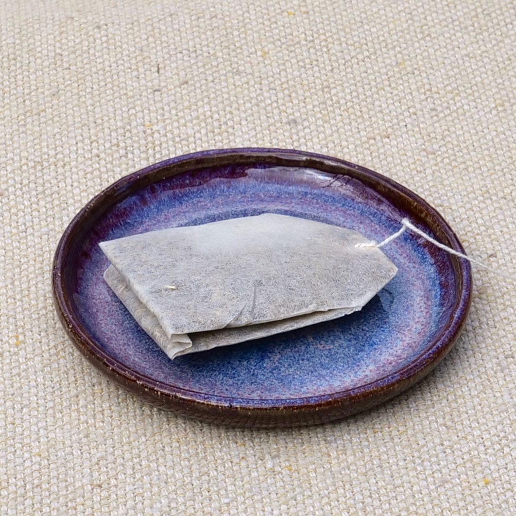 tiny handmade ceramic plate, teabag holder, trinket dish, purple and pink glaze, wheel thrown