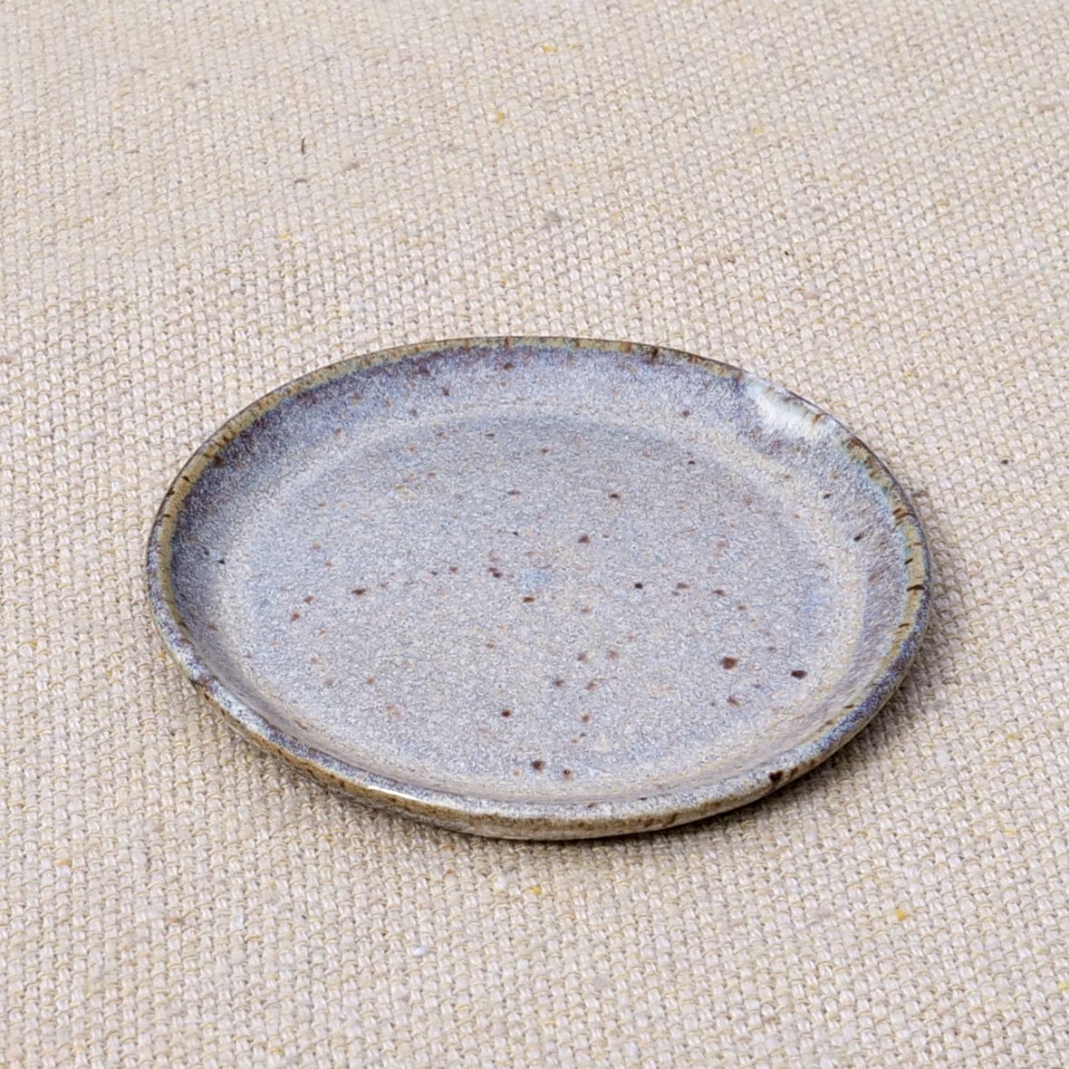 tiny handmade ceramic plate, teabag holder, trinket dish, earthy neutral granite speckled pattern, wheel thrown