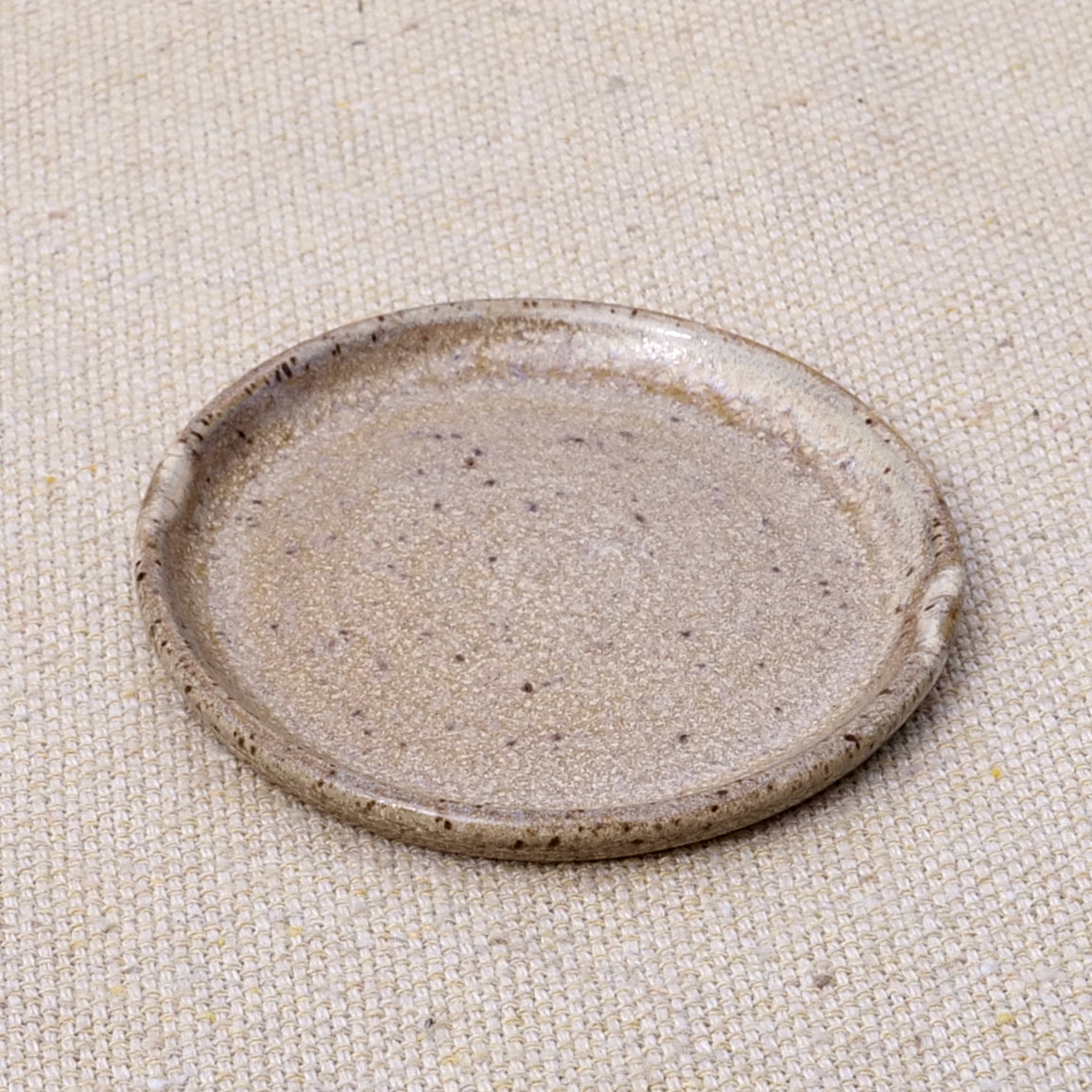 tiny handmade ceramic plate, teabag holder, trinket dish, earthy neutral granite speckled pattern, wheel thrown