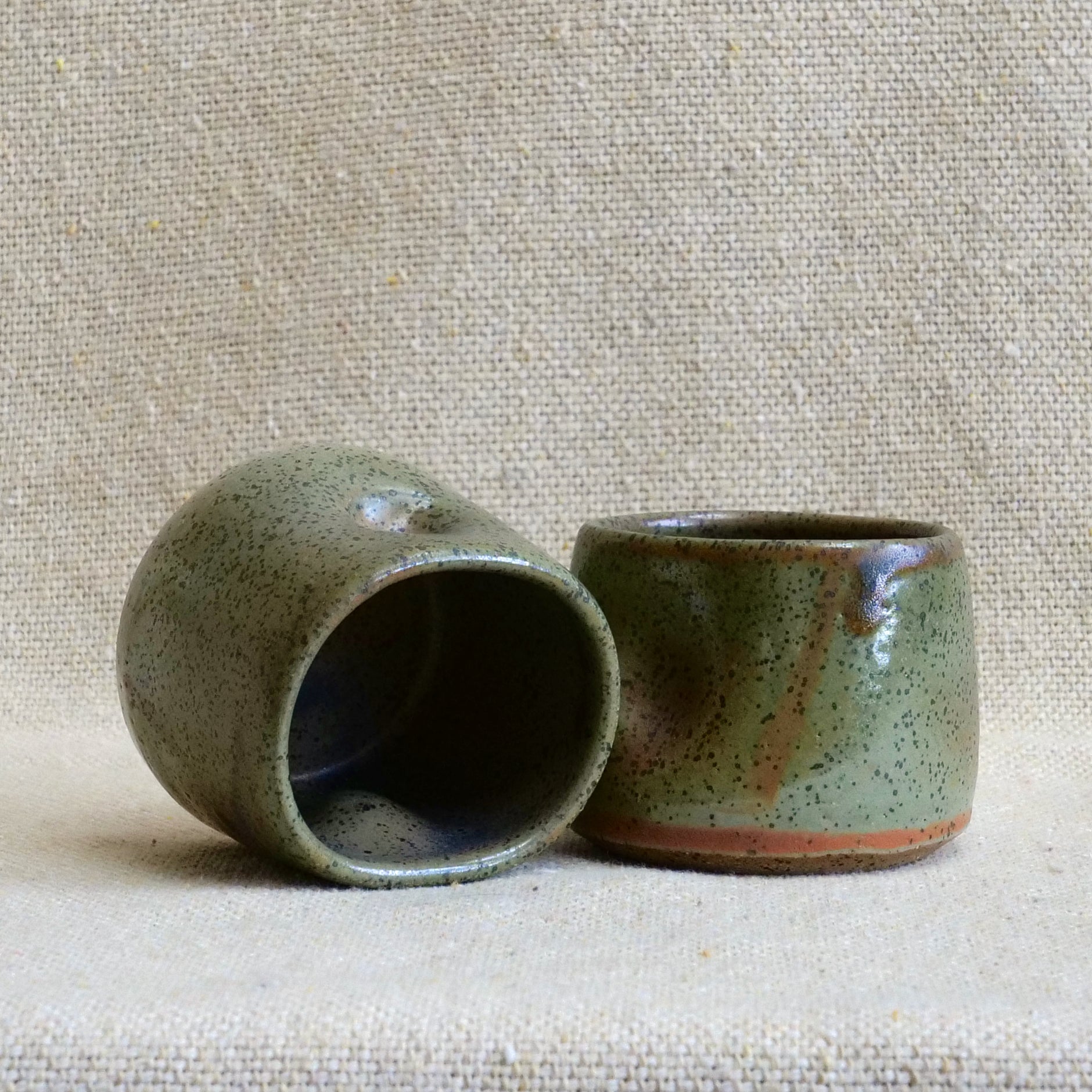 handmade ceramic espresso cortado cup, earthy green speckled glaze, pinch cup, thumb cup, pottery