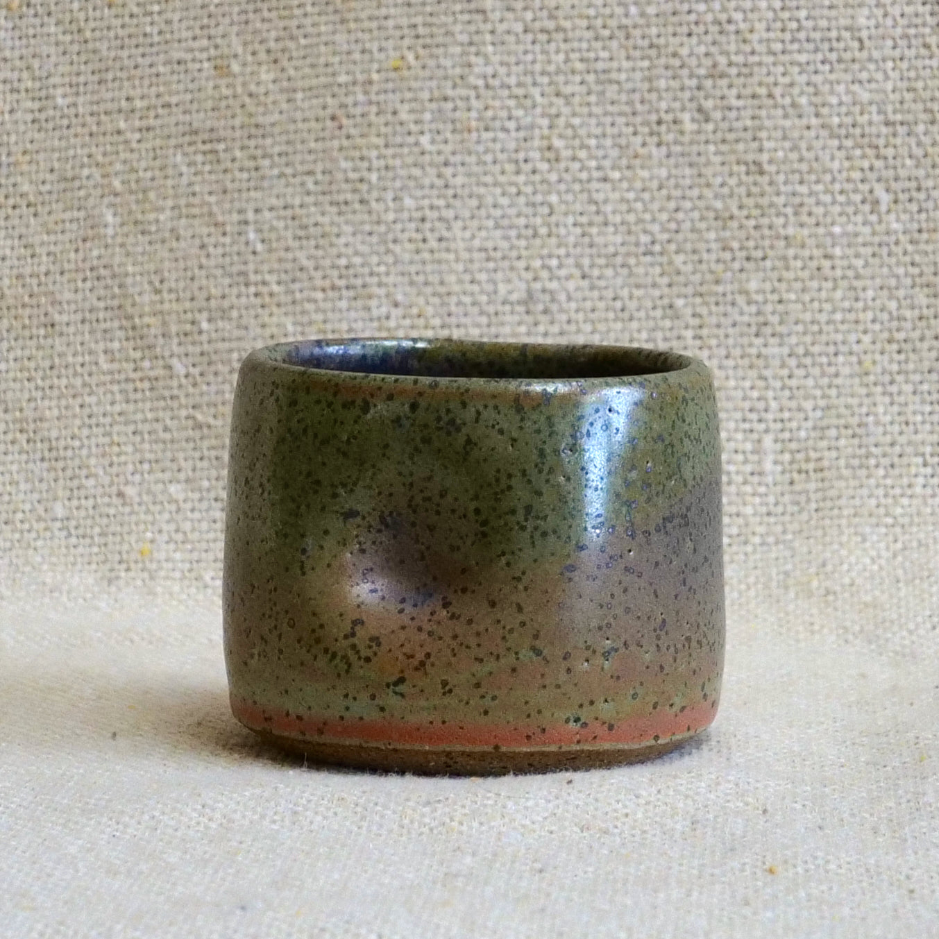 handmade ceramic espresso cortado cup, earthy green speckled glaze, pinch cup, thumb cup, pottery