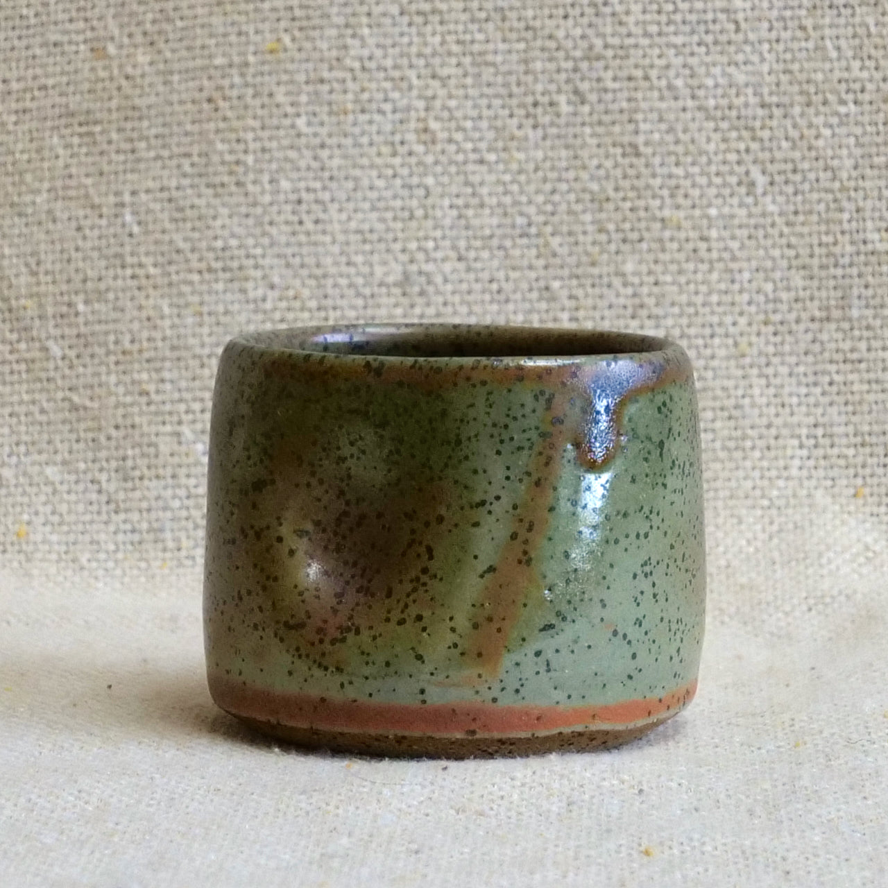 handmade ceramic espresso cortado cup, earthy green speckled glaze, pinch cup, thumb cup, pottery