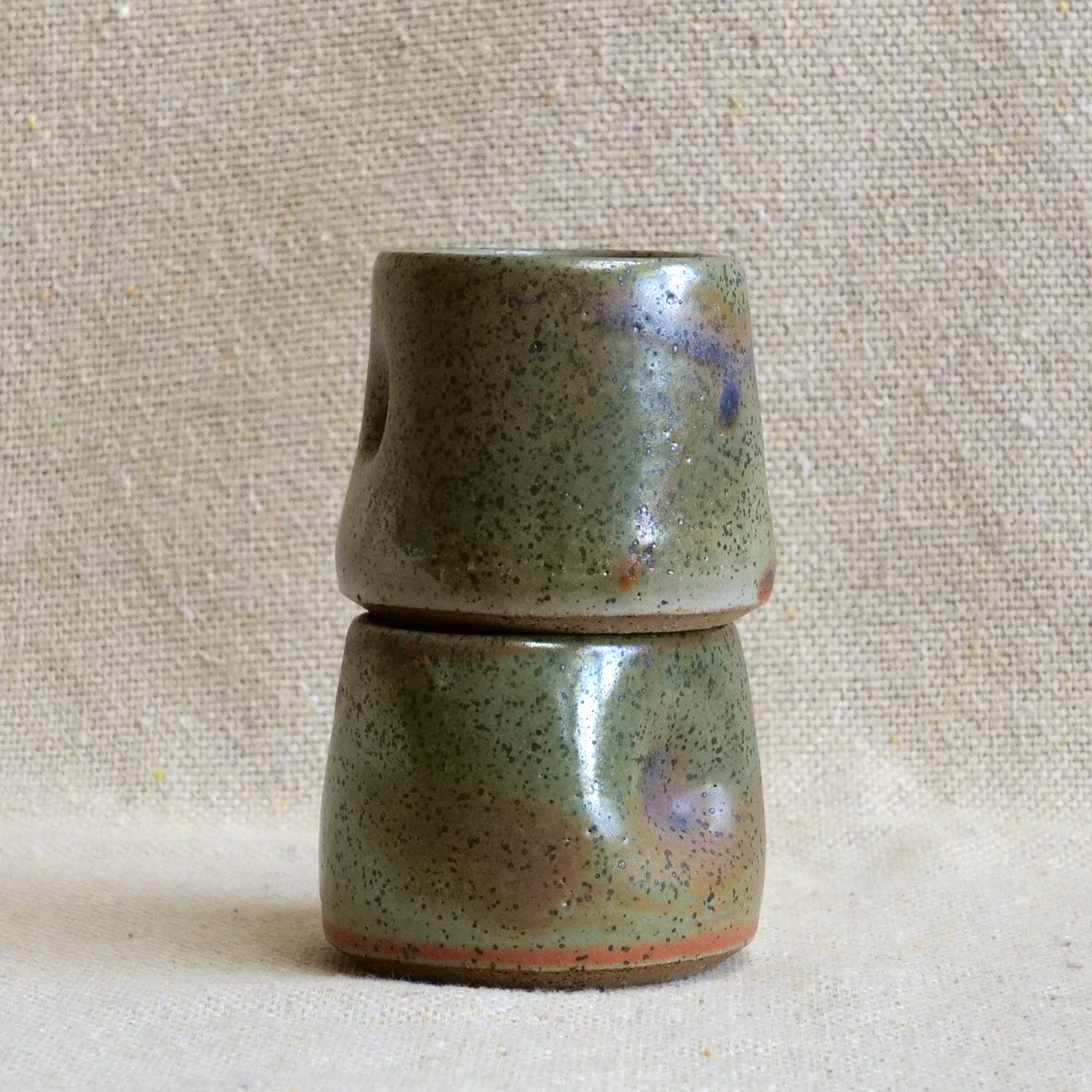 handmade ceramic espresso cortado cup, earthy green speckled glaze, pinch cup, thumb cup, pottery