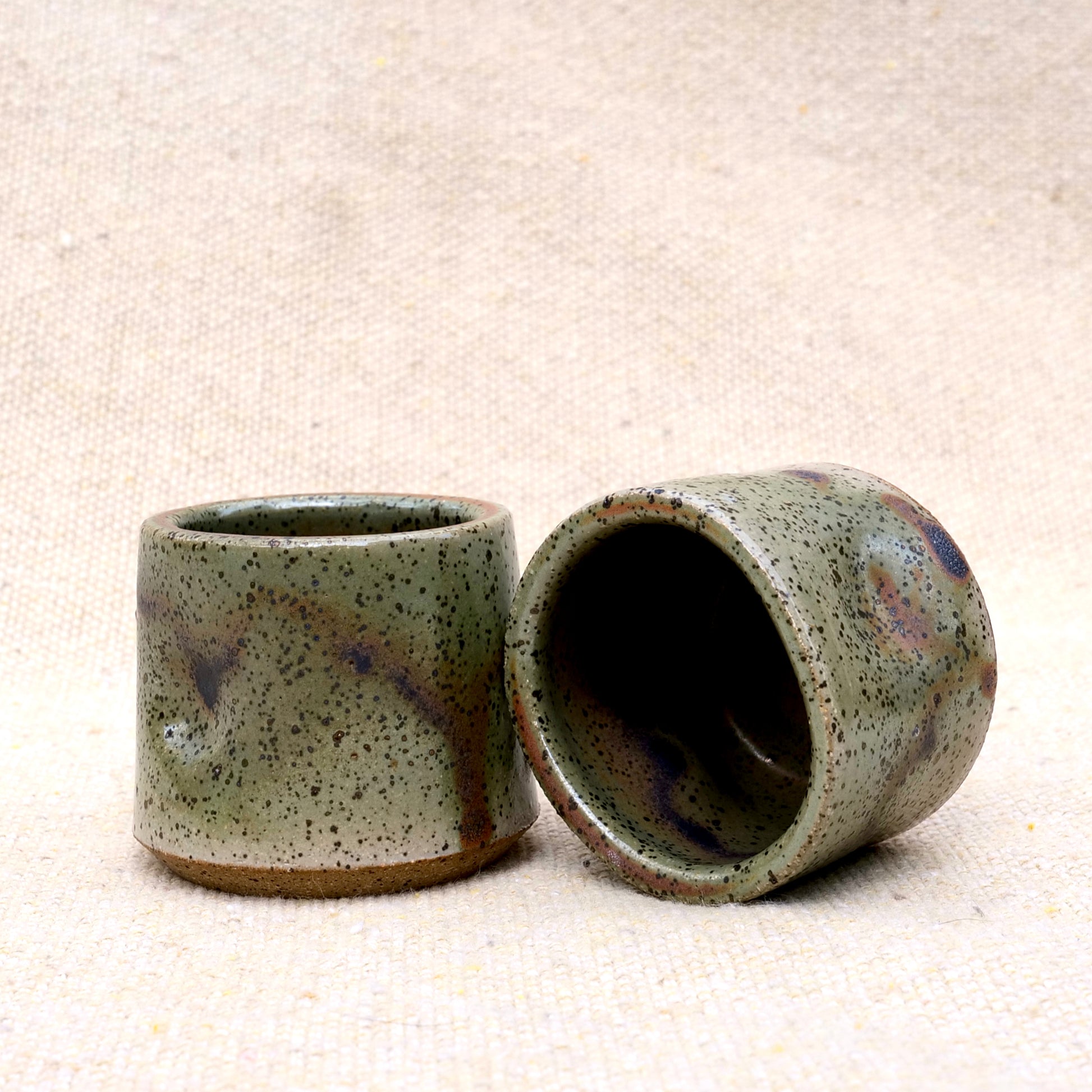 handmade ceramic espresso cup, earthy green glaze, pinch cup, thumb cup, pottery