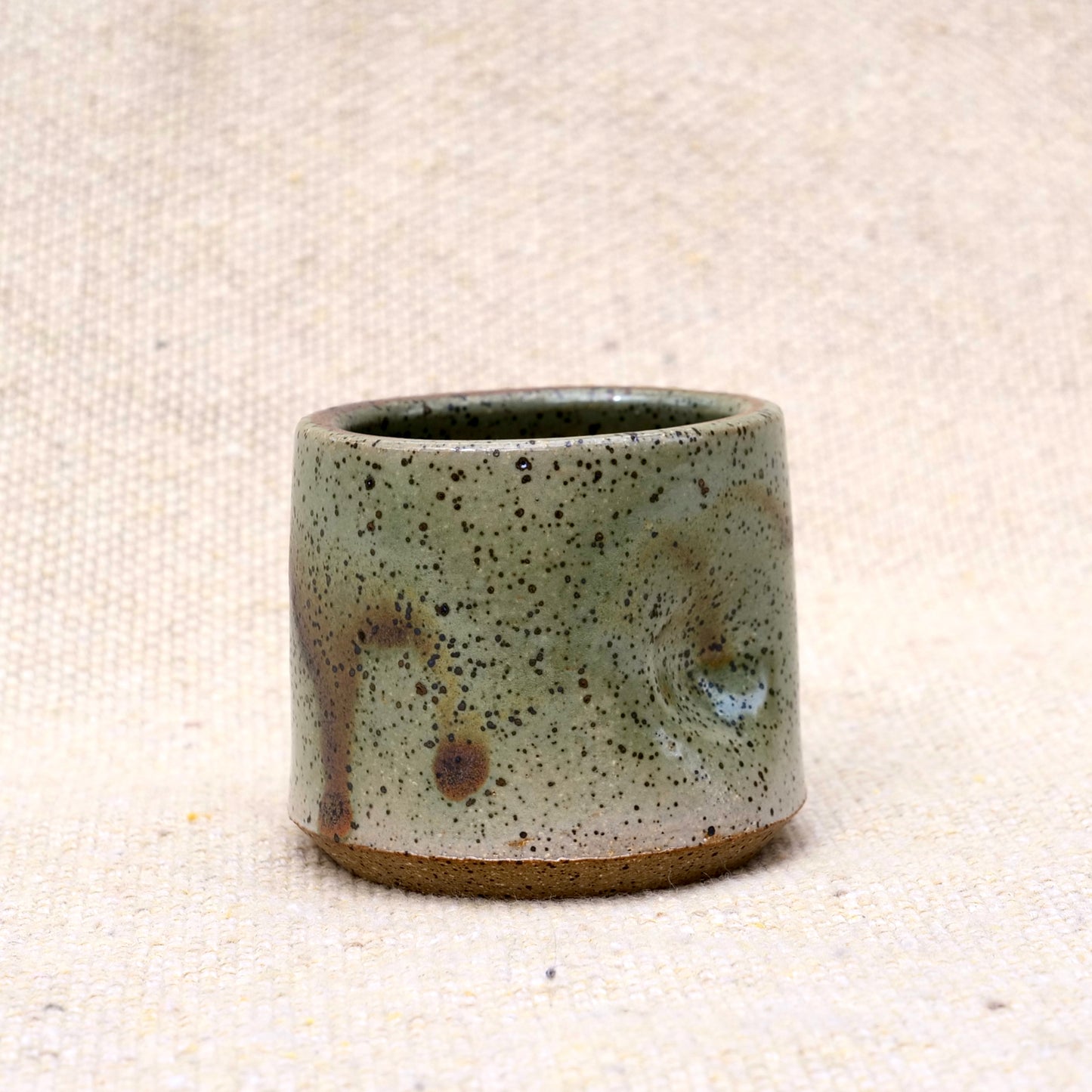 handmade ceramic espresso cup, earthy green glaze, pinch cup, thumb cup, pottery