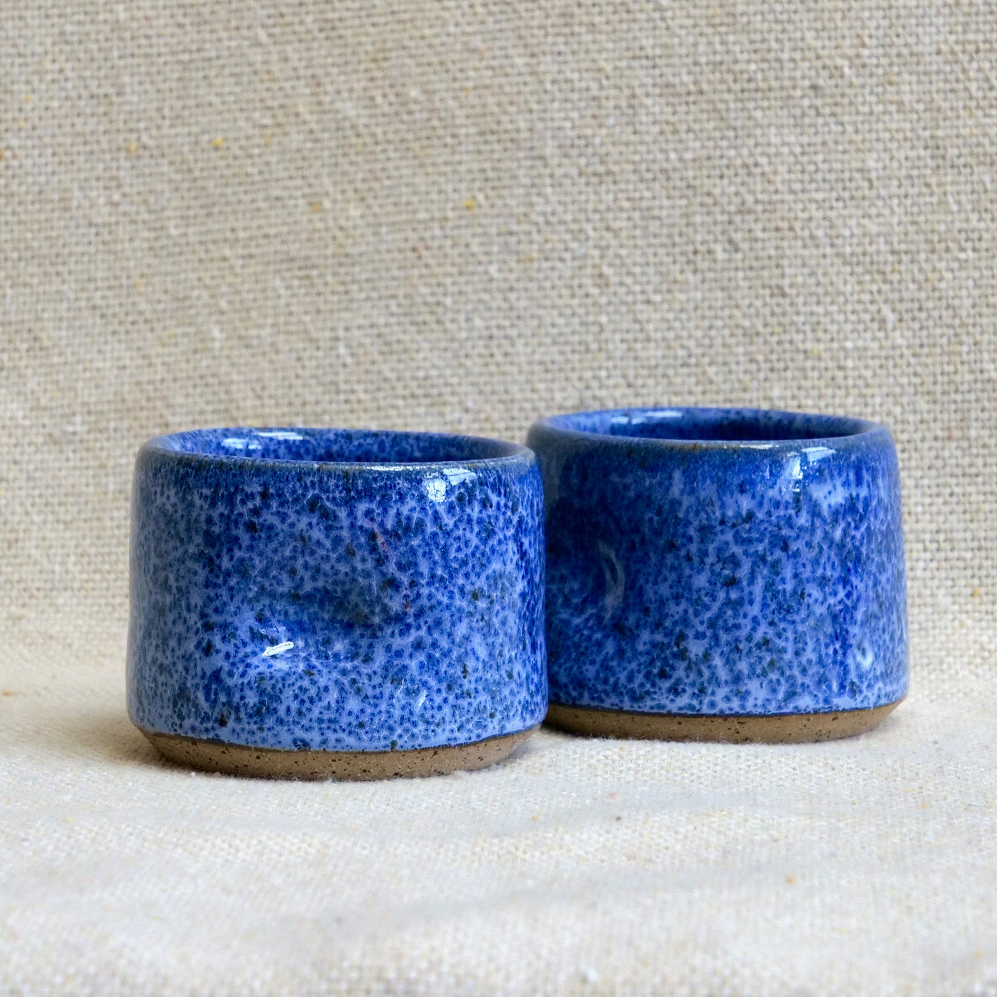 handmade ceramic espresso cortado cup, blue speckled glaze, pinch cup, thumb cup, pottery